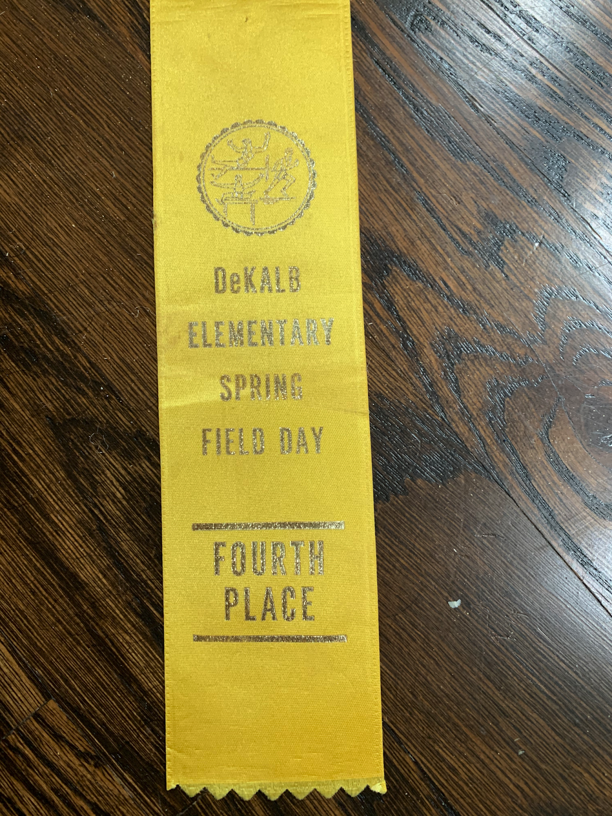 Ribbon for earning fourth place at field day at DeKalb Elementary School